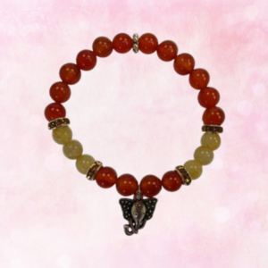 Embrace abundance and protection with the Carnelian, Citrine, & Ganesha Charm. Handcrafted for positivity and blessings.