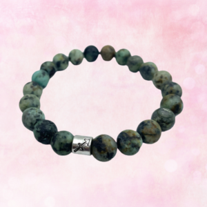 Discover the enchanting allure of the African Turquoise Bracelet—a captivating piece that empowers transformation, intuition, and self-expression.