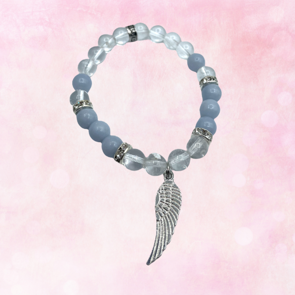 Find inner harmony with the Angelite & Clear Quartz Bracelet. Serene blue of Angelite and clarity of Clear Quartz uplift your spirit.