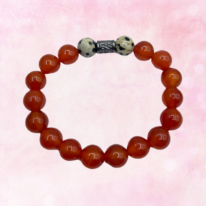 "Embrace vitality with the Carnelian and Dalmatian Jasper Bracelet. Grounding, empowering, and joyous energies await you."