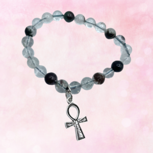 Elevate your style and energy with the Garden Quartz and Ahnk Charm Bracelet. Embrace its unique blend of beauty and spiritual significance.