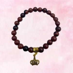 Embrace earthy elegance and royal charm with the empowering Mahogany Obsidian and Gold Crown Bracelet. Elevate your style and spirit today.