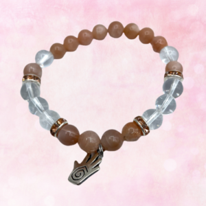 Discover serenity and clarity with Peach Moonstone and Clear Quartz Bracelet, a harmonious blend for positive energy and personal growth.
