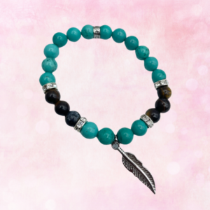 Harmonize with nature's elements through the Turquoise, Tiger Eye, & Feather Charm Bracelet. Embrace balance, courage, and freedom.
