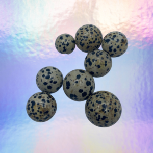 Discover the charm of Dalmatian Jasper spheres: playful patterns, grounding energies, creative inspiration, and protective aura.