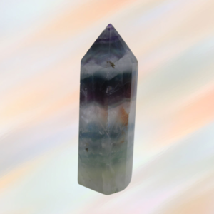 Discover the allure of Fluorite points - vibrant colors, balancing energies, and spiritual growth in a captivating crystal. Embrace the magic!