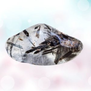 Tourmaline Quartz: Harmonious fusion of Tourmaline's grounding and Quartz's amplifying energies. A beacon for balance and clarity in life.