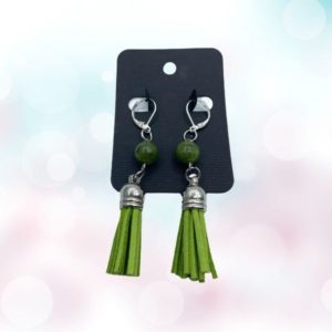 Discover the elegance and serenity of Green Jade Earrings, adorned with profound metaphysical significance for inner peace and protection.