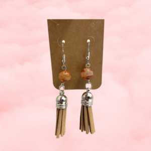 Discover the timeless allure of brown agate earrings, rooted in history and imbued with grounding properties, offering both beauty and balance.