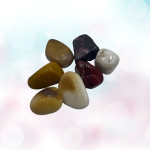 Discover Mookaite Tumbles: Vibrant, grounding gem with geological history. Harness its energy for strength and creativity.